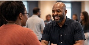 Members greeting each other at Faith Fellowship